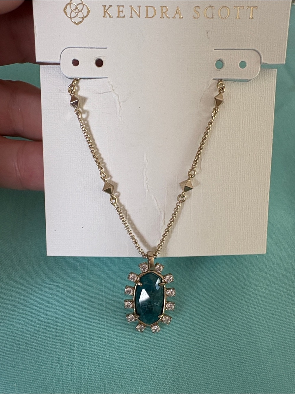Nwt Kendra Scott Necklace Gold with Teal blue stone, cubic zirconia stones - Picture 2 of 5